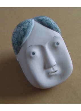 White and blue painted wooden head titled I remember by Eishi Takaoka